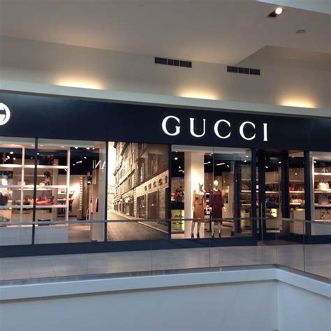 simon gucci outlet locations